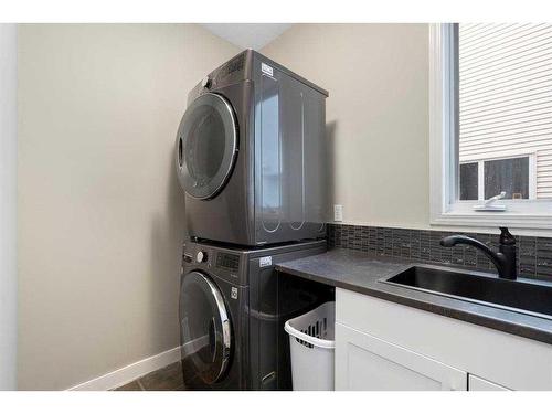 50 Discovery Ridge Road Sw, Calgary, AB - Indoor Photo Showing Laundry Room