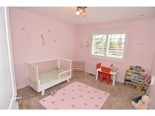 50 Discovery Ridge Road Sw, Calgary, AB - Indoor Photo Showing Bedroom