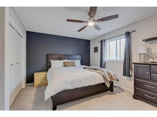 59 Rivercrest Circle Se, Calgary, AB - Indoor Photo Showing Bedroom