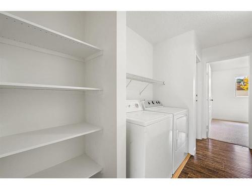 1004-2200 Woodview Drive Sw, Calgary, AB - Indoor Photo Showing Laundry Room