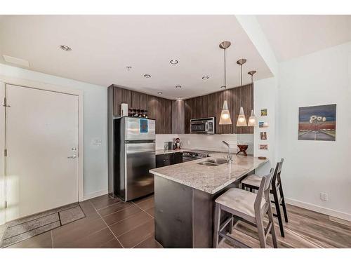 405-788 12 Avenue Sw, Calgary, AB - Indoor Photo Showing Kitchen With Stainless Steel Kitchen With Double Sink With Upgraded Kitchen