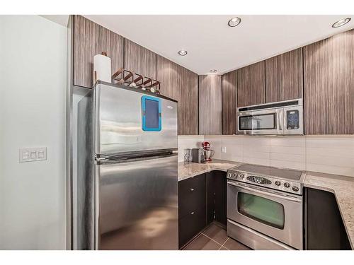 405-788 12 Avenue Sw, Calgary, AB - Indoor Photo Showing Kitchen With Stainless Steel Kitchen