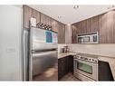 405-788 12 Avenue Sw, Calgary, AB  - Indoor Photo Showing Kitchen With Stainless Steel Kitchen 