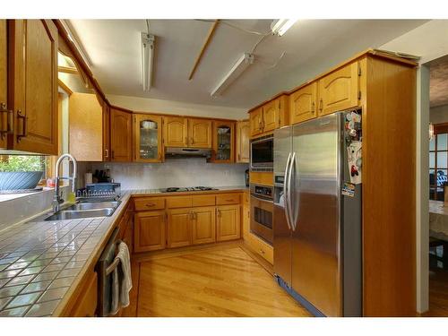 43 Signal Hill Mews Sw, Calgary, AB - Indoor Photo Showing Kitchen With Stainless Steel Kitchen With Double Sink