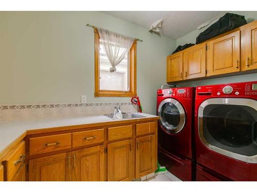 43 Signal Hill Mews Sw, Calgary, AB - Indoor Photo Showing Laundry Room