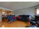 43 Signal Hill Mews Sw, Calgary, AB  - Indoor Photo Showing Living Room 