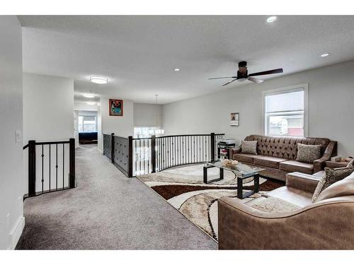 61 Saddlestone Park Ne, Calgary, AB - Indoor Photo Showing Living Room