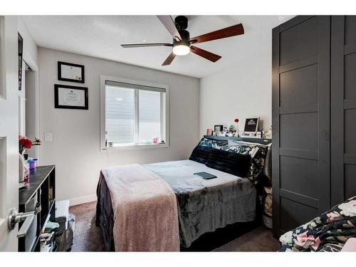 61 Saddlestone Park Ne, Calgary, AB - Indoor Photo Showing Bedroom