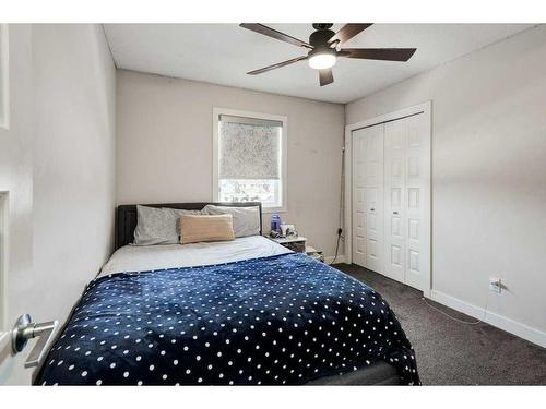 61 Saddlestone Park Ne, Calgary, AB - Indoor Photo Showing Bedroom