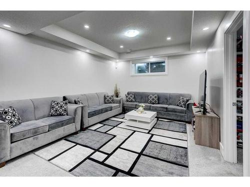 61 Saddlestone Park Ne, Calgary, AB - Indoor Photo Showing Living Room