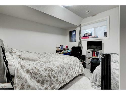 61 Saddlestone Park Ne, Calgary, AB - Indoor Photo Showing Bedroom