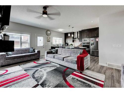 61 Saddlestone Park Ne, Calgary, AB - Indoor Photo Showing Living Room