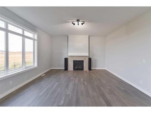 98 Waterford Road, Chestermere, AB - Indoor With Fireplace