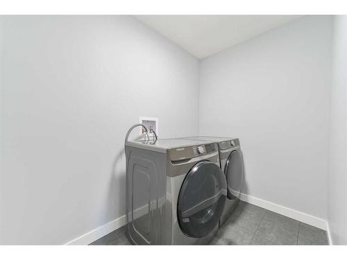 98 Waterford Road, Chestermere, AB - Indoor Photo Showing Laundry Room