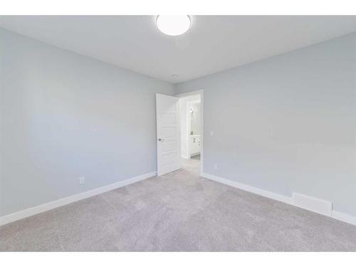 98 Waterford Road, Chestermere, AB - Indoor Photo Showing Other Room