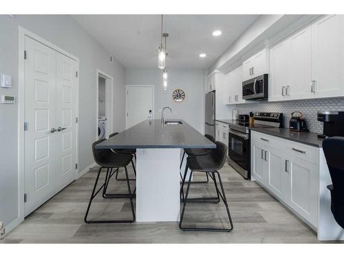 1401-42 Cranbrook Gardens Se, Calgary, AB - Indoor Photo Showing Kitchen With Upgraded Kitchen