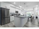 1401-42 Cranbrook Gardens Se, Calgary, AB  - Indoor Photo Showing Kitchen With Upgraded Kitchen 