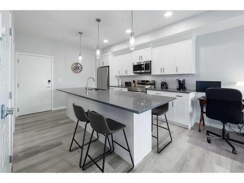 1401-42 Cranbrook Gardens Se, Calgary, AB - Indoor Photo Showing Kitchen With Upgraded Kitchen