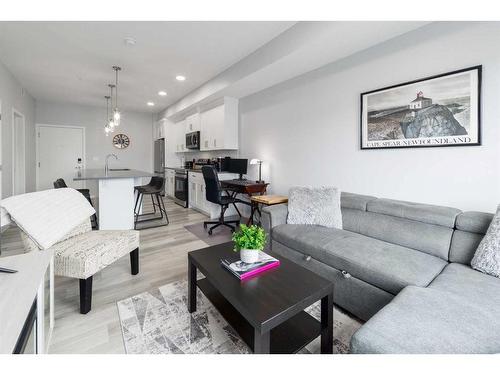 1401-42 Cranbrook Gardens Se, Calgary, AB - Indoor Photo Showing Living Room