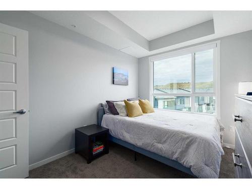 1401-42 Cranbrook Gardens Se, Calgary, AB - Indoor Photo Showing Bedroom