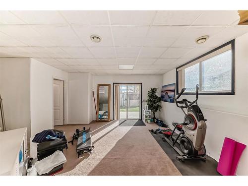 182 Panatella Circle Nw, Calgary, AB - Indoor Photo Showing Gym Room