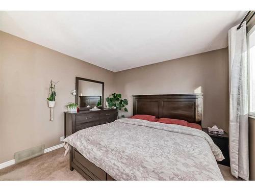 1131 Ranchlands Boulevard Nw, Calgary, AB - Indoor Photo Showing Bedroom