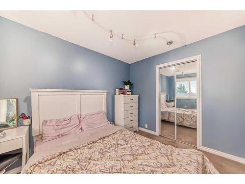 1131 Ranchlands Boulevard Nw, Calgary, AB - Indoor Photo Showing Bedroom