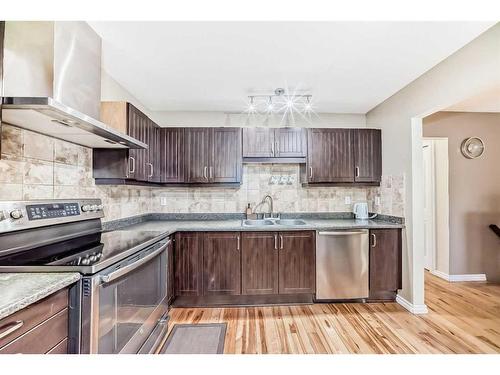 1131 Ranchlands Boulevard Nw, Calgary, AB - Indoor Photo Showing Kitchen With Stainless Steel Kitchen