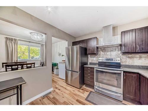 1131 Ranchlands Boulevard Nw, Calgary, AB - Indoor Photo Showing Kitchen With Stainless Steel Kitchen