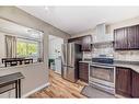 1131 Ranchlands Boulevard Nw, Calgary, AB  - Indoor Photo Showing Kitchen With Stainless Steel Kitchen 