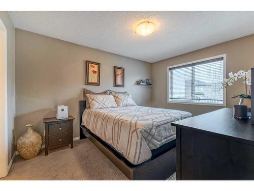 3007 Windsong Boulevard Sw, Airdrie, AB - Indoor Photo Showing Bedroom