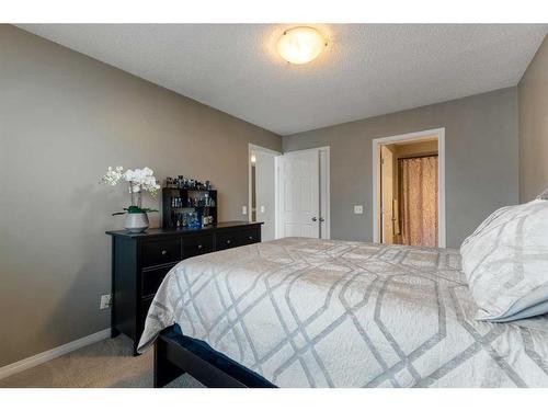 3007 Windsong Boulevard Sw, Airdrie, AB - Indoor Photo Showing Bedroom