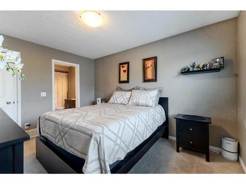 3007 Windsong Boulevard Sw, Airdrie, AB - Indoor Photo Showing Bedroom