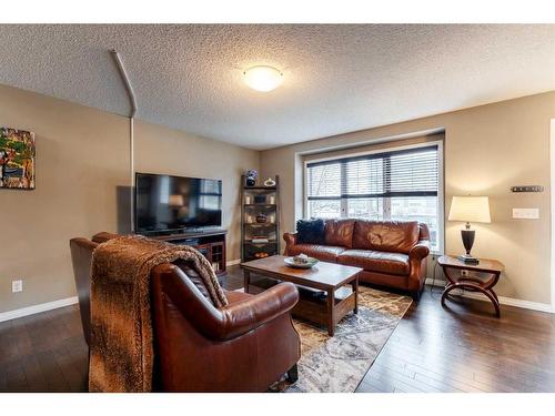 3007 Windsong Boulevard Sw, Airdrie, AB - Indoor Photo Showing Living Room