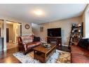 3007 Windsong Boulevard Sw, Airdrie, AB  - Indoor Photo Showing Living Room 