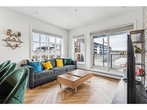 212-4275 Norford Avenue Nw, Calgary, AB - Indoor Photo Showing Living Room