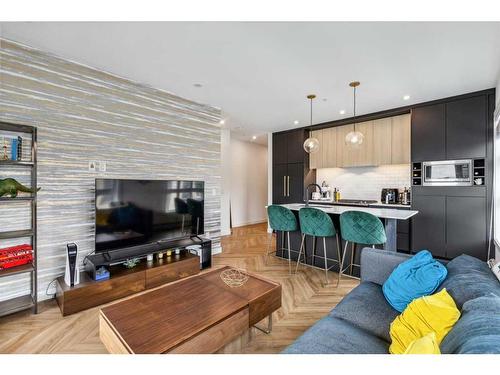 212-4275 Norford Avenue Nw, Calgary, AB - Indoor Photo Showing Living Room