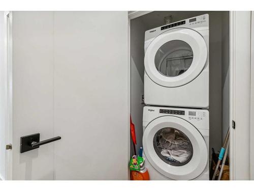 212-4275 Norford Avenue Nw, Calgary, AB - Indoor Photo Showing Laundry Room