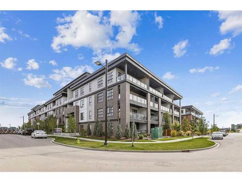 212-4275 Norford Avenue Nw, Calgary, AB - Outdoor With Balcony With Facade