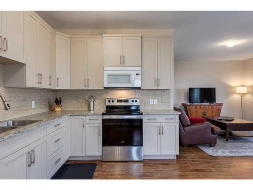 576-500 Harrison Court, Crossfield, AB - Indoor Photo Showing Kitchen