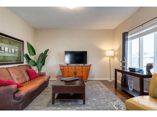 576-500 Harrison Court, Crossfield, AB - Indoor Photo Showing Living Room