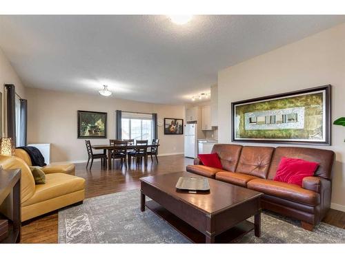 576-500 Harrison Court, Crossfield, AB - Indoor Photo Showing Living Room