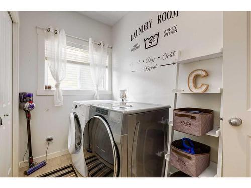 576-500 Harrison Court, Crossfield, AB - Indoor Photo Showing Laundry Room