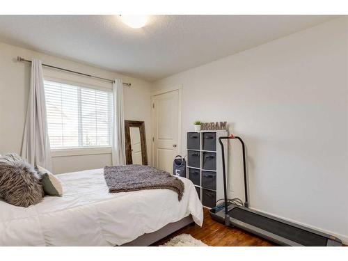 576-500 Harrison Court, Crossfield, AB - Indoor Photo Showing Bedroom