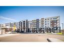 2317-4641 128 Avenue Ne, Calgary, AB  - Outdoor With Balcony With Facade 