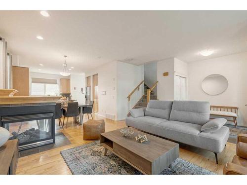 2805 4 Avenue Nw, Calgary, AB - Indoor Photo Showing Living Room With Fireplace