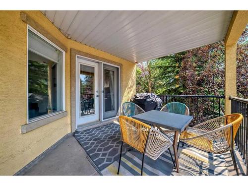 205-735 56 Avenue Sw, Calgary, AB - Outdoor With Deck Patio Veranda With Exterior