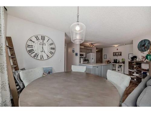 205-735 56 Avenue Sw, Calgary, AB - Indoor Photo Showing Dining Room