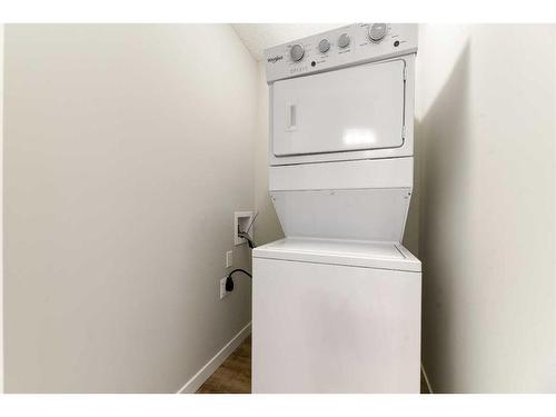 221 Redstone Boulevard Ne, Calgary, AB - Indoor Photo Showing Laundry Room