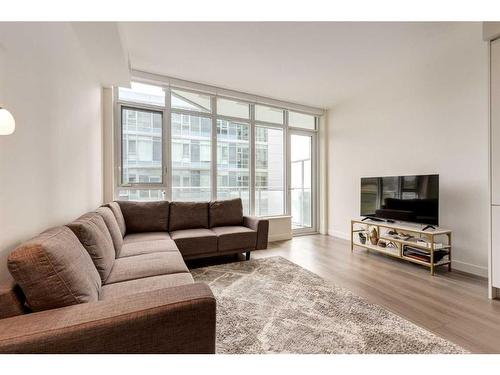 311-138 Waterfront Court Sw, Calgary, AB - Indoor Photo Showing Living Room